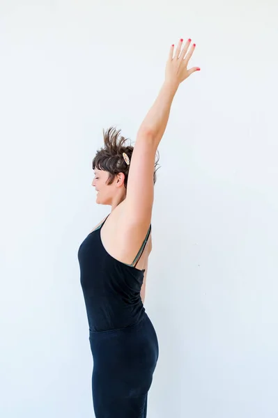 Yoga students showing different yoga poses — Stock Photo, Image