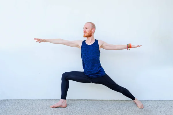 Yoga teacher showing different yoga poses — Stock Photo, Image