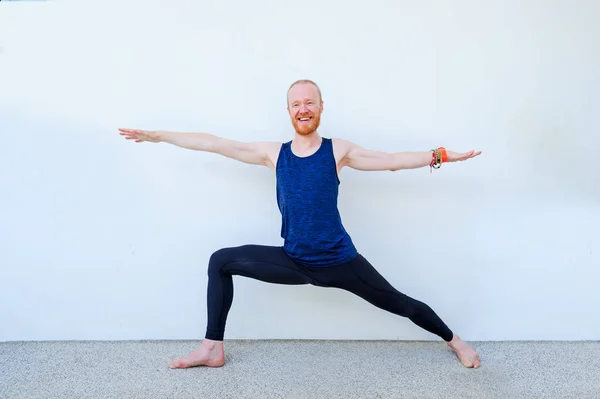 Yoga teacher showing different yoga poses — Stock Photo, Image