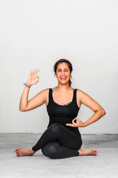 Yoga students showing different yoga poses — Stock Photo, Image