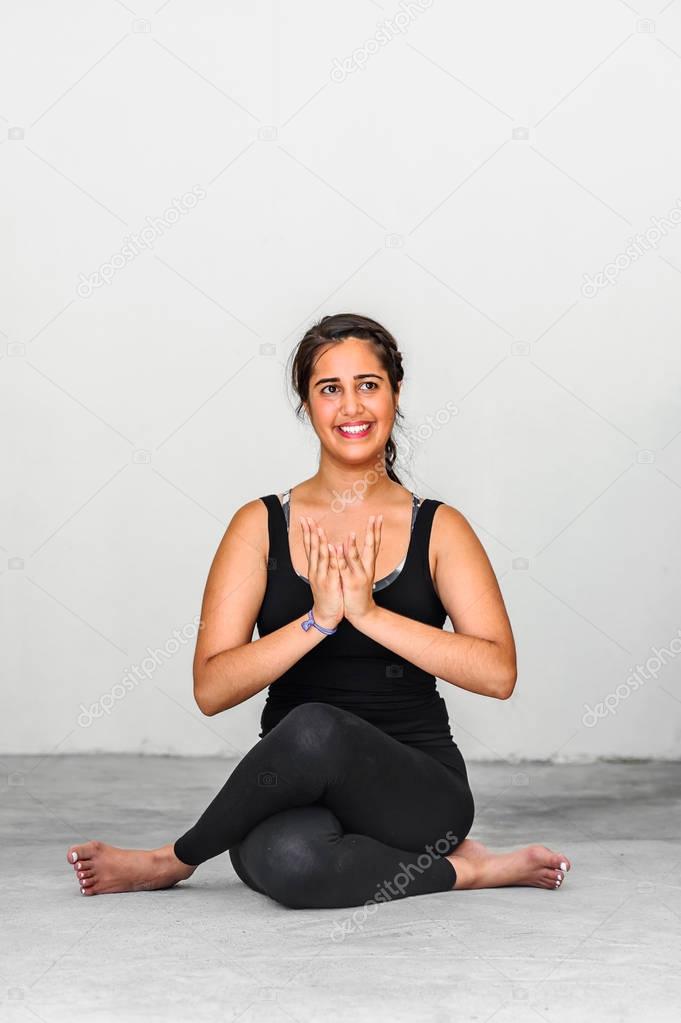 Yoga students showing different yoga poses 