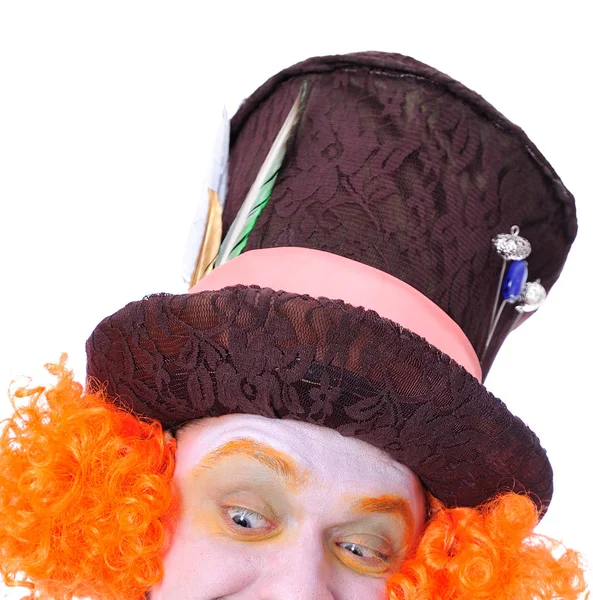 Mad hatter's different facial emotions. Close-up portrait of smiling and fooling around animator in various theater roles. Only eyes and hat — Stock Photo, Image