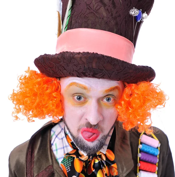 Mad hatter's different facial emotions. Close-up portrait of smiling and fooling around animator in various theater roles. Showing tongue — Stock Photo, Image