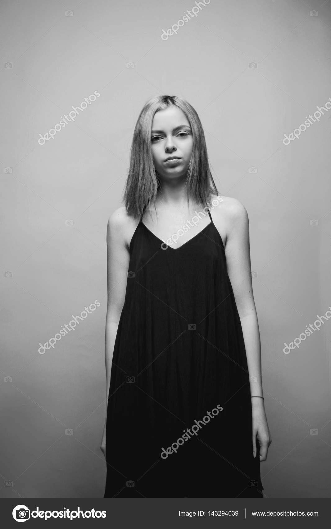 Sad Girl With Brown Eyes The Blonde With Short Hair She Looks