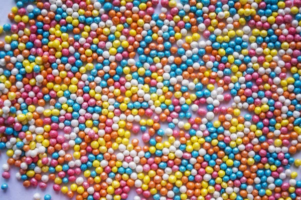 Tło wielobarwny pastelowych kropi. Kolorowe cukierki niewiele. Wielkanoc — Zdjęcie stockowe