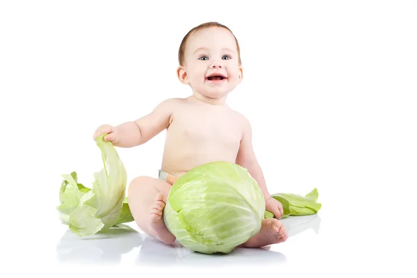 Baby with cabbage — Stock Photo, Image