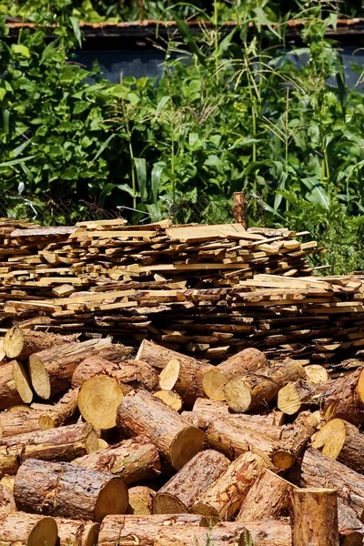 Lumber stored in farm yard — Stock Photo, Image