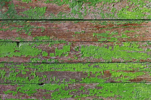 Old rude painted plank boards as a background — Stock Photo, Image