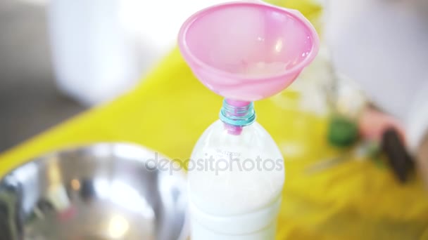 Close up of a woman making ice cream at children 's fair — стоковое видео