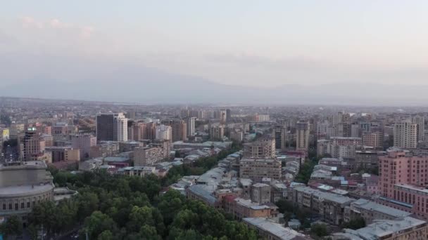 YEREVAN, ARMENIA - JULY 2019: Tilt up top view drone shot of center of Yerevan and opera — 비디오