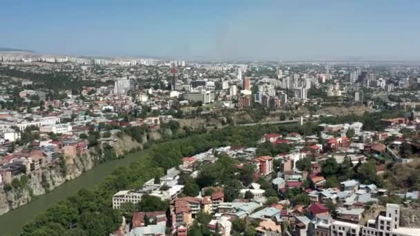 TBILISI, GEORGIA - JULY 2019: Aerial drone flying over Tbilisi center panorama in summer — 비디오