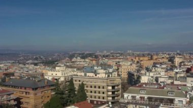 Aerial view of residential district of Rome, Italy. Tilt up panoramic shot.