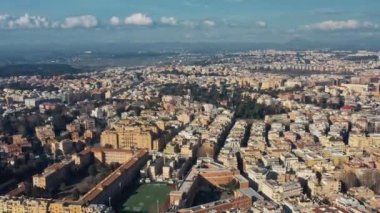 Aerial view of residential district of Rome, Italy. Tilt up panoramic shot.