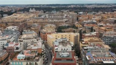 Aerial view of residential district of Rome, Italy. Tilt up panoramic shot.