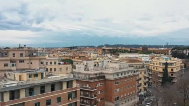 Aerial view of residential district of Rome, Italy. Tilt up panoramic shot.