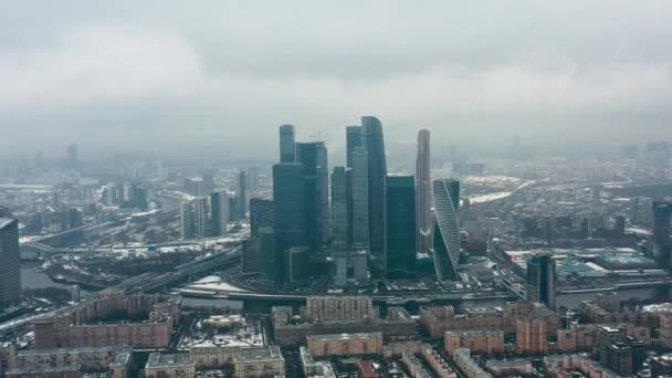 Aerial drone shot of Moscow city skyscrapers at cloudy winter day — Stock Video