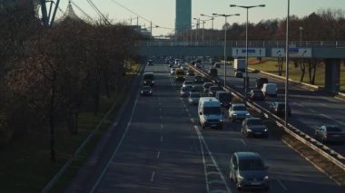 MUNICH - NOVEMBER 21: Left to right pan real time establishing shot of a highway near the Olympic Park in Munich, November 21, 2018 in Munich, Germany.