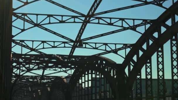 Tilt down real time shot of a road bridge in Munich. Traffic on the bridge on an autumn day. — Stock videók