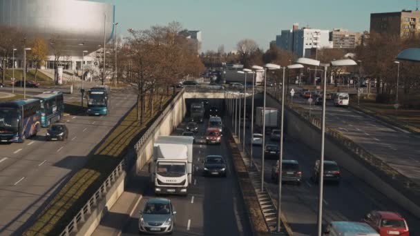 MUNICH - NOVEMBER 21: Locked down real time establishing shot of a highway in Munich. Traffic on the road, November 21, 2018 in Munich. — ストック動画