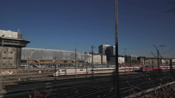 MUNICH - NOVEMBER 20: Right to left pan real time shot of the railway in Munich. The movement of trains on the railway, November 20, 2018 in Munich, Germany. — 비디오