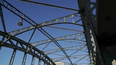 MUNICH - NOVEMBER 20: Tilt down real time shot of a road bridge in Munich. Traffic on the bridge on an autumn day, November 20, 2018 in Munich, Germany.