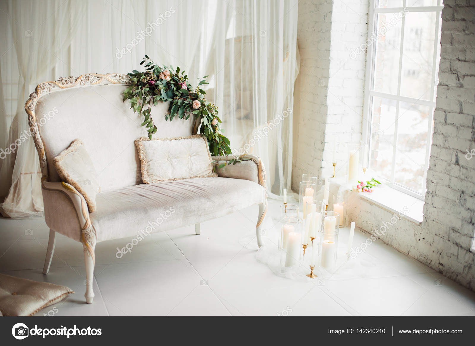 Candles And Flowers On The Couch Stock Photo C Failiz Ukr
