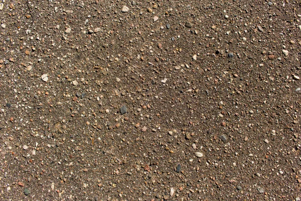 Textura de revestimento de estrada de asfalto pesado cinza e marrom — Fotografia de Stock