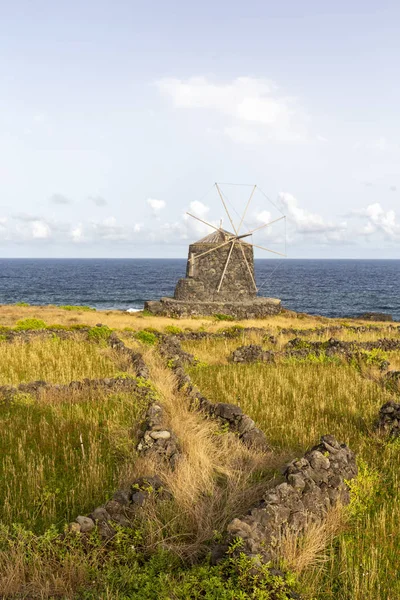 Ancient Stone Walls leading to a Wind Mill