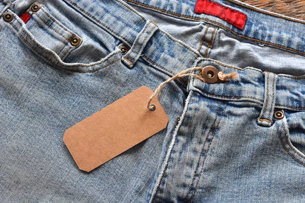 Zamknij Się Obraz Spodnie Jeansowe Brązowego Papieru Cena Tag — Zdjęcie stockowe