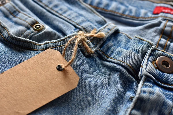 Zamknij Się Obraz Spodnie Jeansowe Brązowego Papieru Cena Tag — Zdjęcie stockowe
