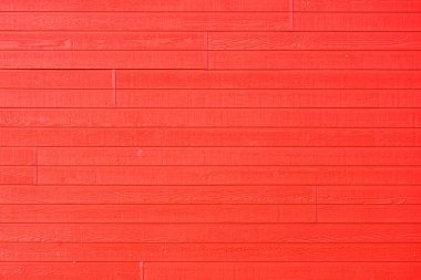 Eski kırmızı ahşap dış duvarın soyut bir görüntüsü.. 