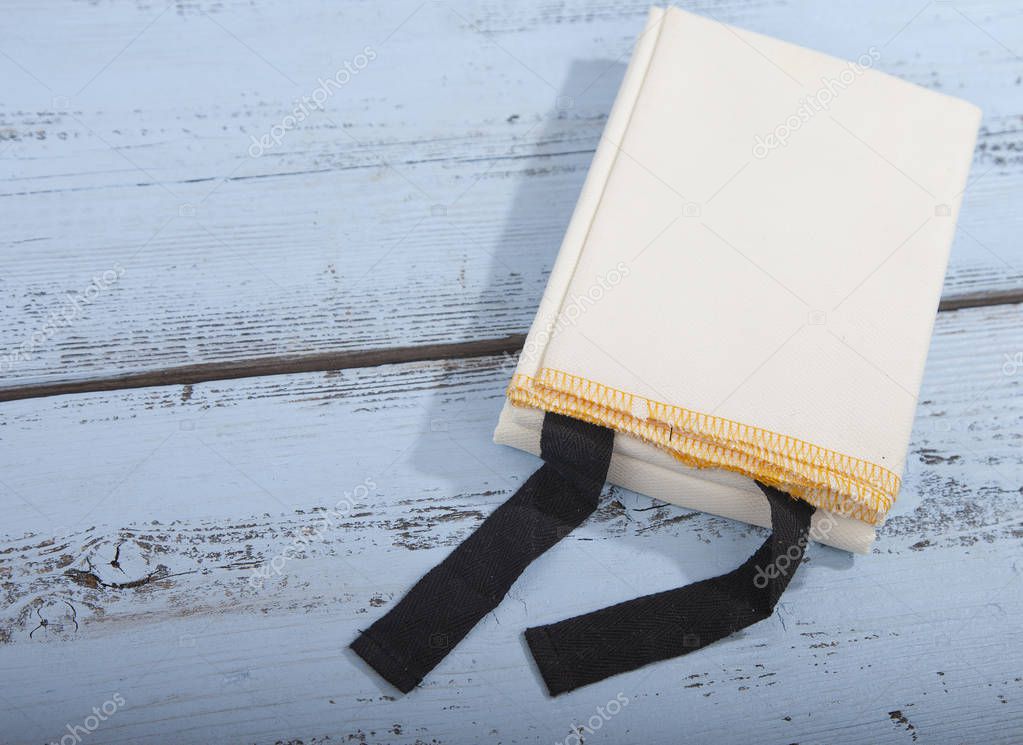 Fireblanket on wooden background