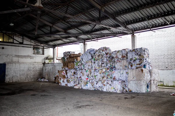 plastic waste is in the warehouse at the garbage disposal plant