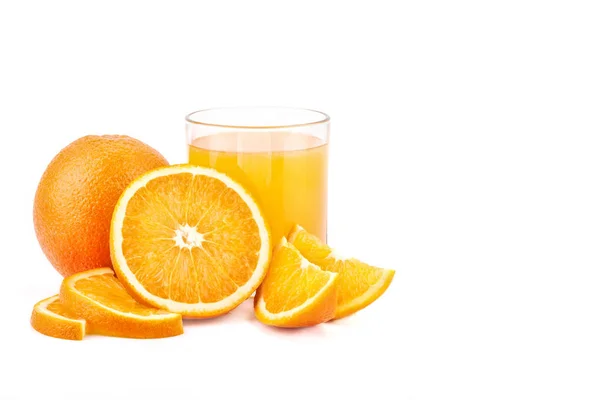 A glass of orange juice with orange and slices on a white background. — Stock Photo, Image