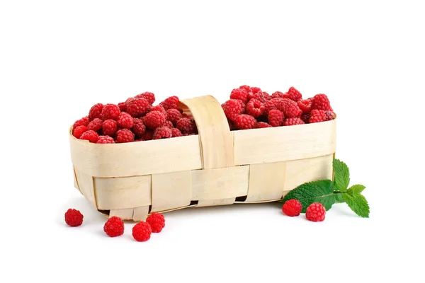 Tasty ripe raspberries in the basket on white background. — Stock Photo, Image