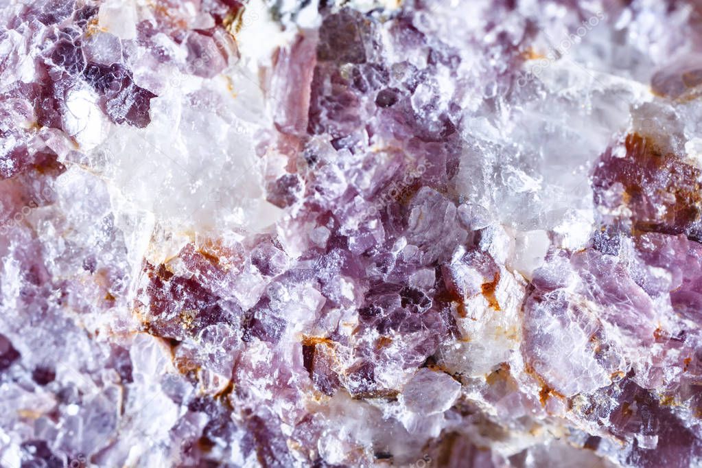 Macro shooting of natural gemstone. Raw mineral lepidolite.