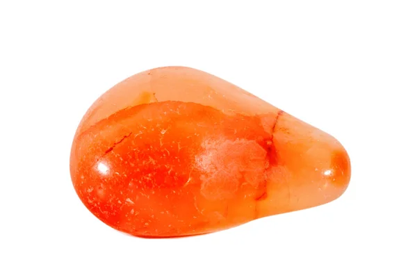 Macro shooting of natural gemstone. Mineral carnelian, India. Isolated object on a white background. — Stock Photo, Image