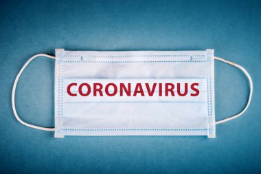 Masada tıbbi maske. Koronavirüs salgını. Coronavirüs gribi, tehlikeli grip. Coronavirus 2019-nCoV. Corona virüsü salgını. Covid19.