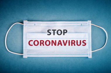 Masada tıbbi maske. Koronavirüs salgını. Coronavirüs gribi, tehlikeli grip. Coronavirus 2019-nCoV. Corona virüsü salgını. Covid19.