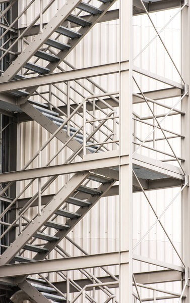 Escape route at a industrial building via exterior metal staircase