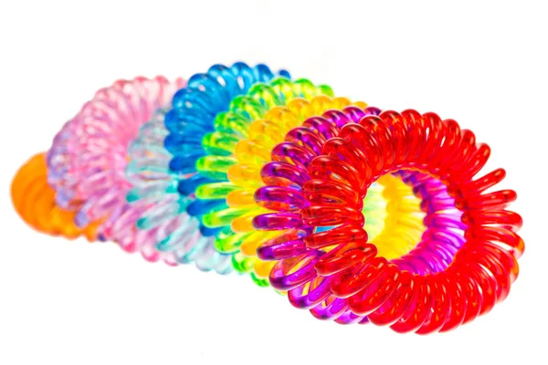 Vários laços de cabelo espiral isolados — Fotografia de Stock