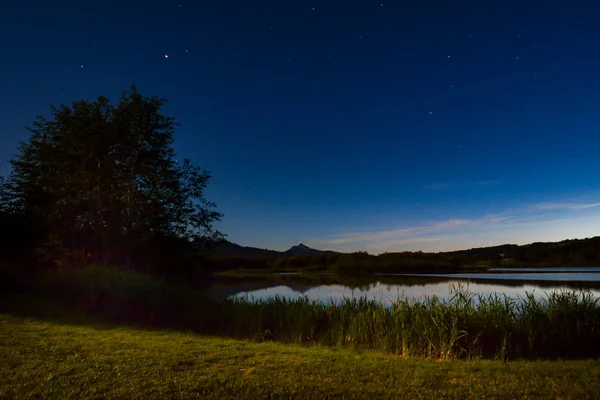 Sky with stars at the lakeside — Stock Photo, Image