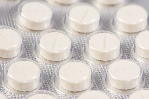 Opakowanie blistrowe z białe tabletki — Zdjęcie stockowe