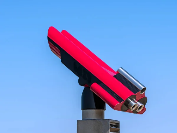 Pink coin telescope and blue sky — Stock Photo, Image
