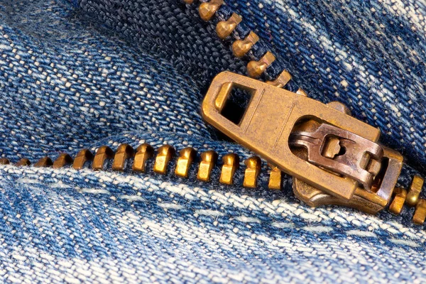 Open zipper of a worn out jeans — Stockfoto