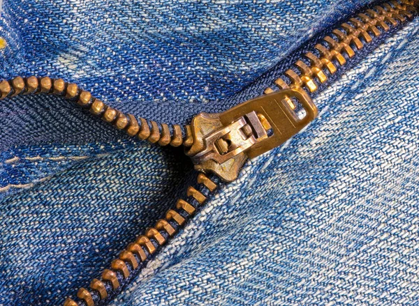 Open zipper of a worn out jeans — Stockfoto