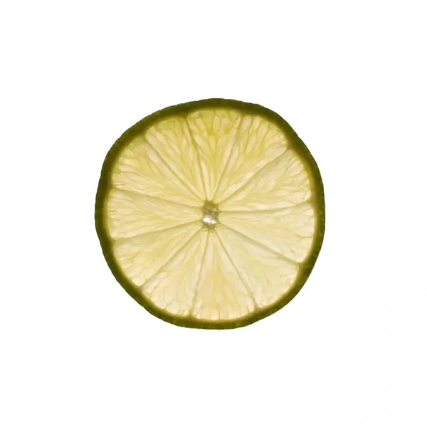 Fetta Lime Con Luce Che Brilla Attraverso Retroilluminazione Mostrando Struttura — Foto Stock