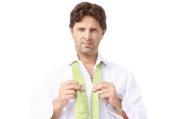 Young man with green tie on black background — Stock Photo, Image