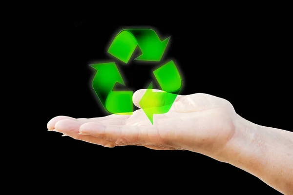 Vrouw hand met het symbool van recycling. — Stockfoto