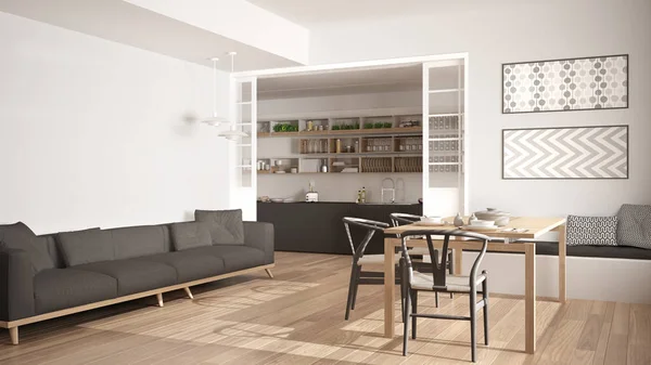 Minimalist kitchen and living room with sofa, table and chairs,